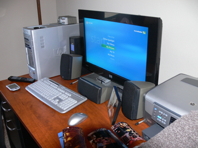 Home Office with Printer Spewing Out "Family" Pictures